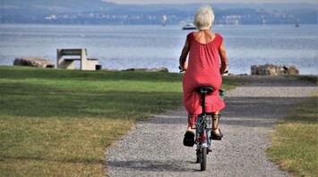 Woman on the bicycle traveling solo