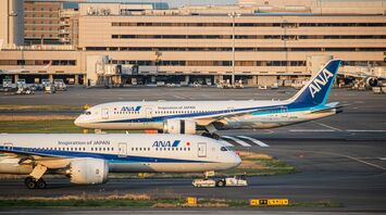 ANA airplanes on the runway at an airport