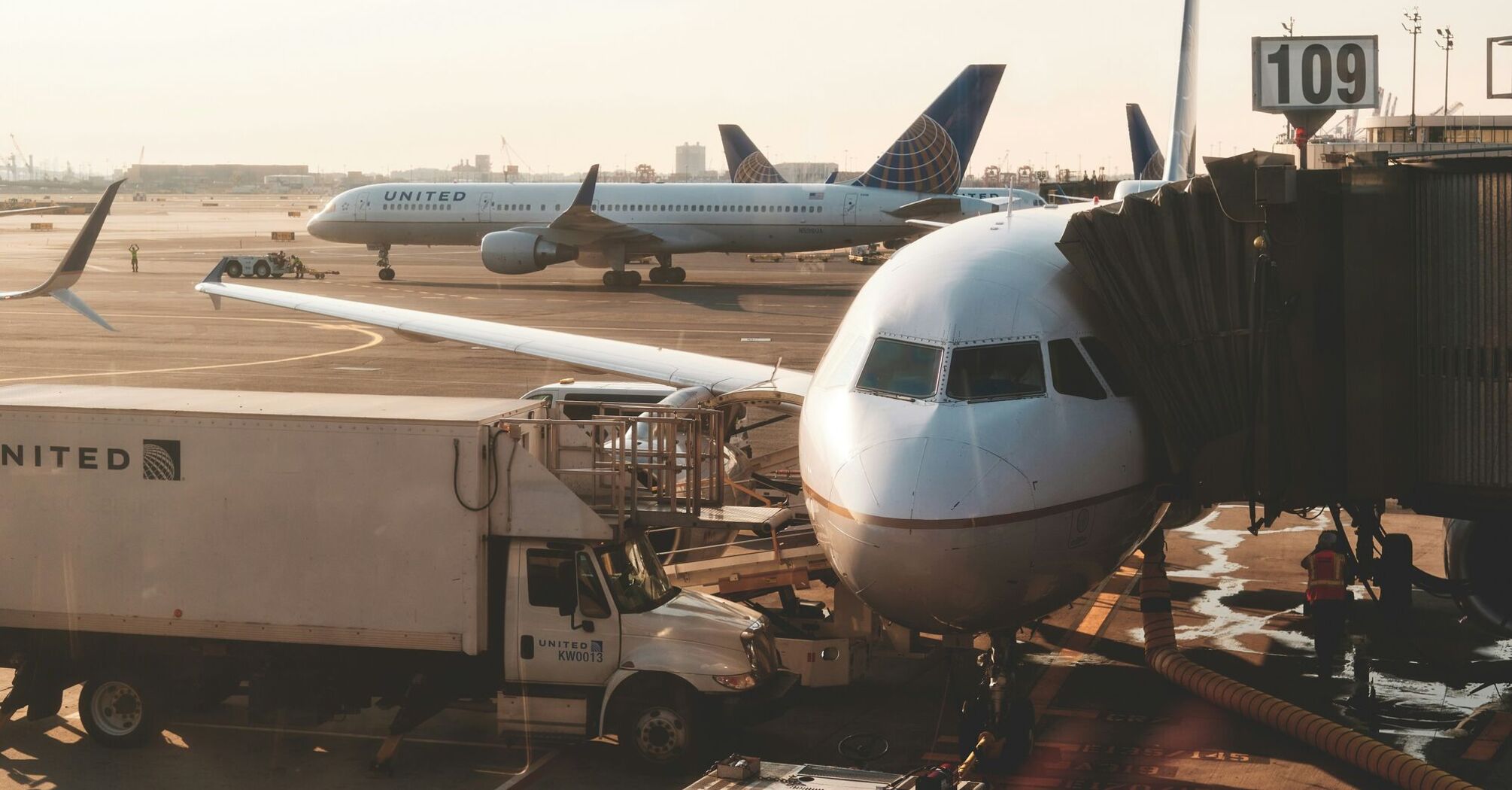 white airplanes at airport during daytime