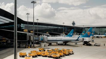 China Southern Airlines planes parked at an airport terminal