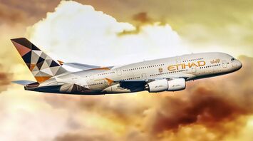 Etihad Airways Airbus A380 in flight during sunset