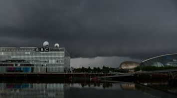 Dark storm clouds loom over the BBC Scotland building