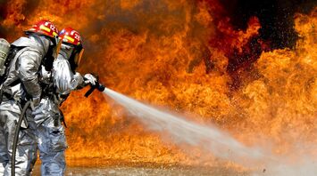 Firefighters battling intense flames