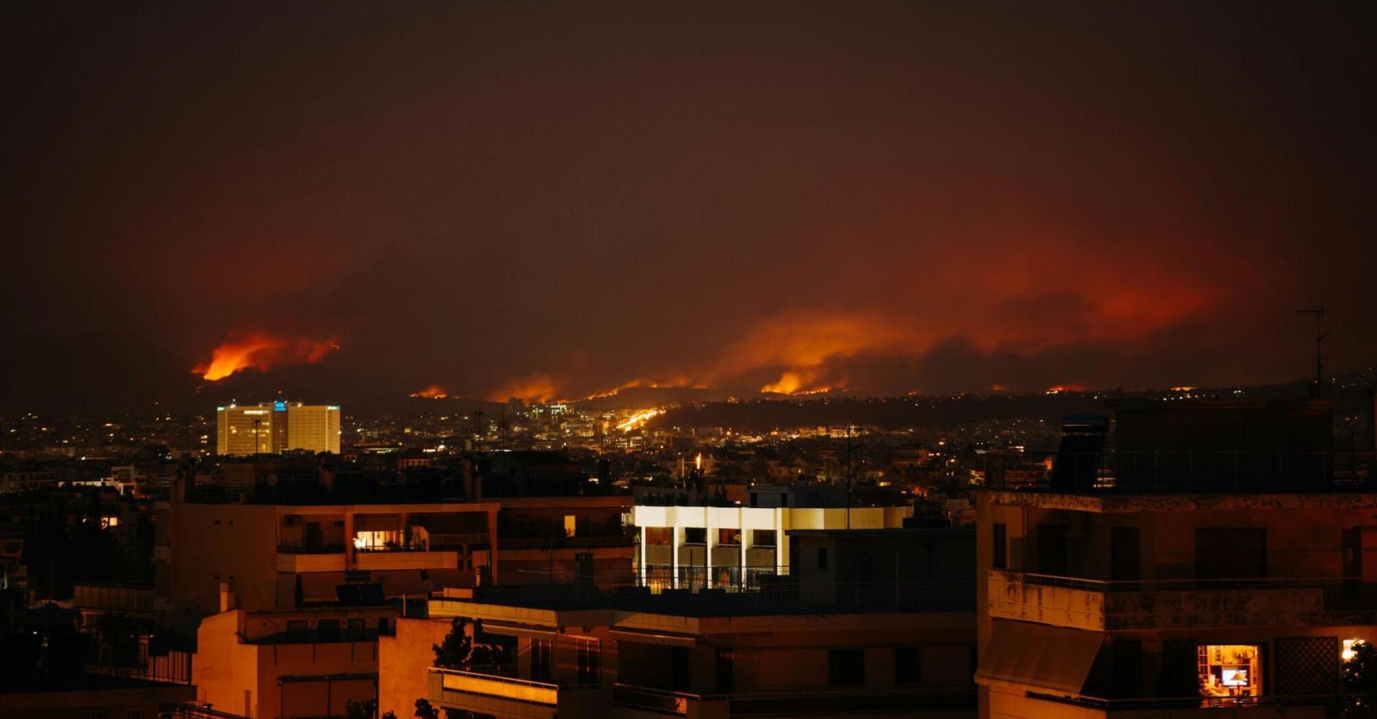 Smoke and fire engulf the nightscape of Athens during the wildfires