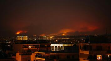 Smoke and fire engulf the nightscape of Athens during the wildfires