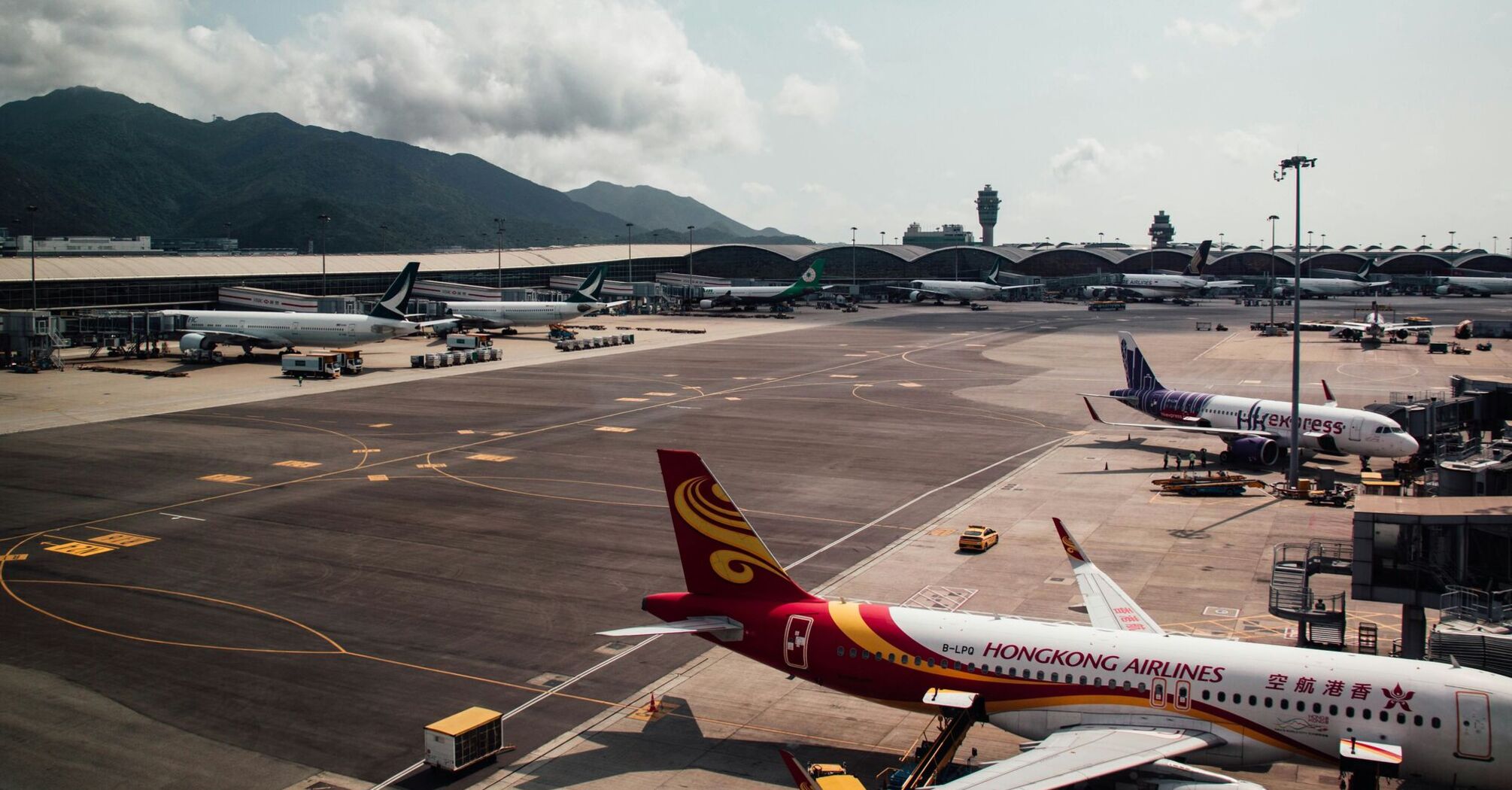 large jetliners sitting on top of an airport tarmac