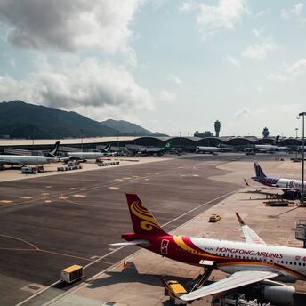large jetliners sitting on top of an airport tarmac