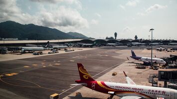 large jetliners sitting on top of an airport tarmac