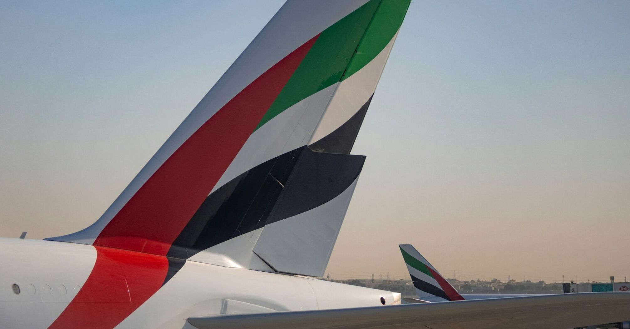 Emirates aircraft tails at the airport