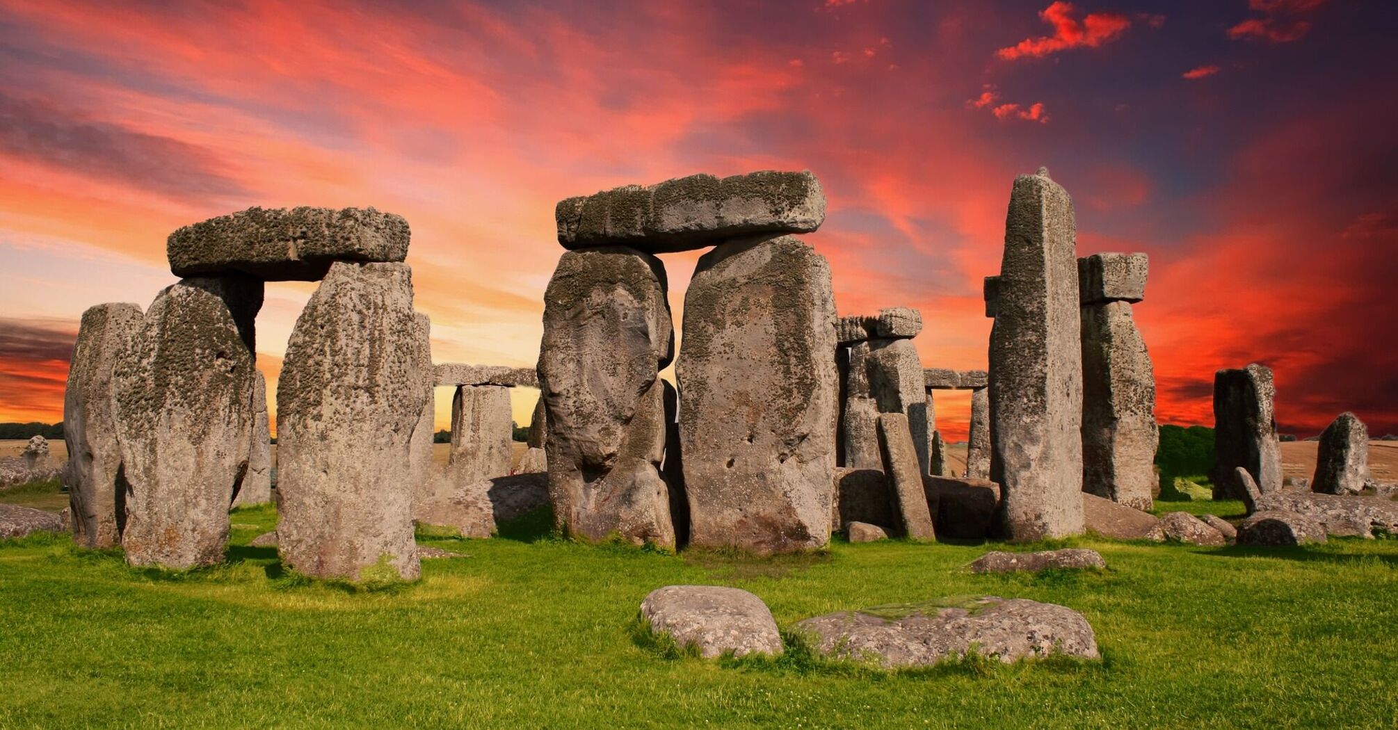 Stonehenge at sunset with vibrant skies