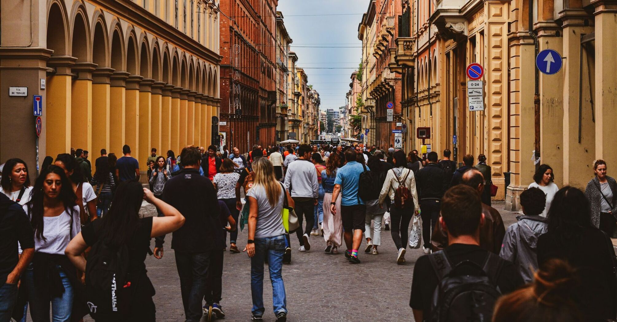 Crowded street in a European city with historic architecture