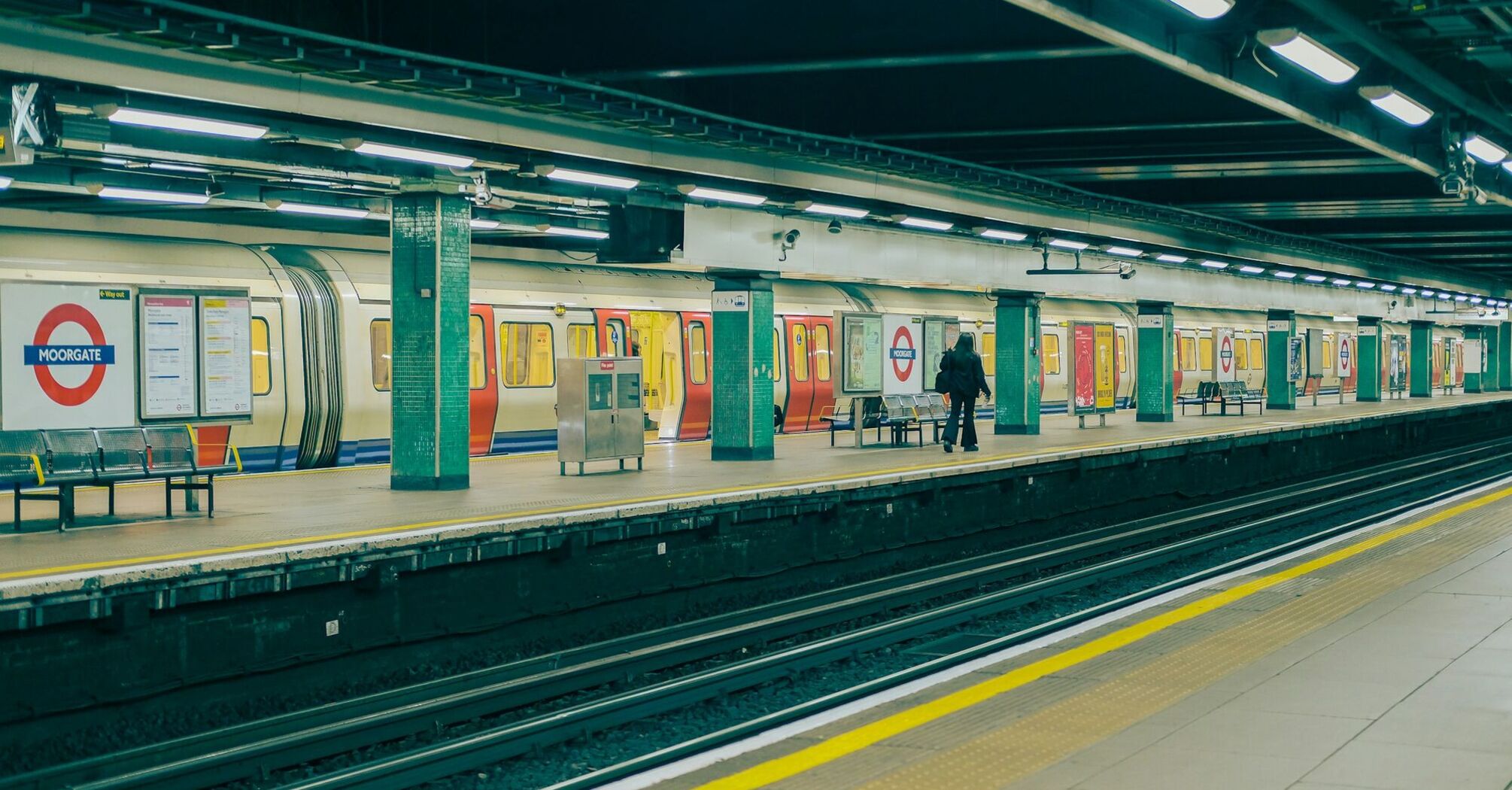 Empty platform at Moorgate London Underground station with a stationary train