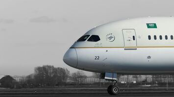 a large jetliner sitting on top of an airport runway