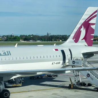 a large jetliner sitting on top of an airport tarmac