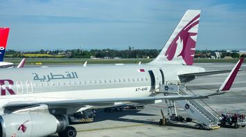 a large jetliner sitting on top of an airport tarmac