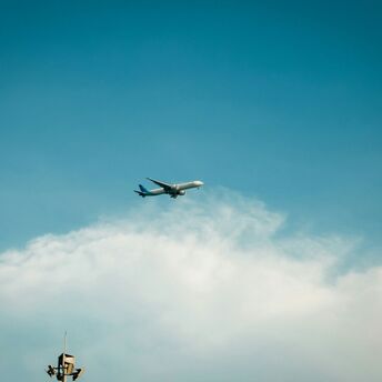 an airplane flying in the sky