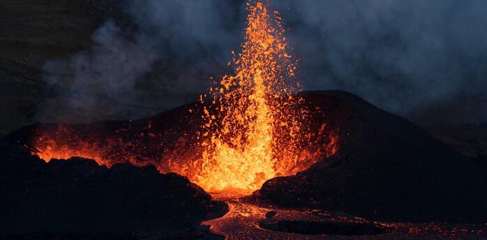 Molten lava erupts from a fissure on the Reykjanes Peninsula in Iceland
