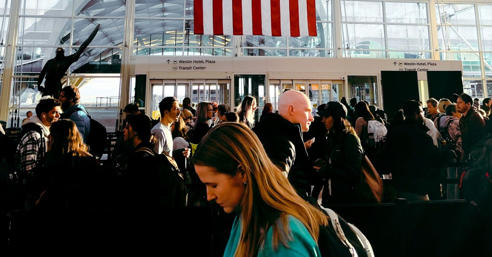 Passengers waiting in line at an airport