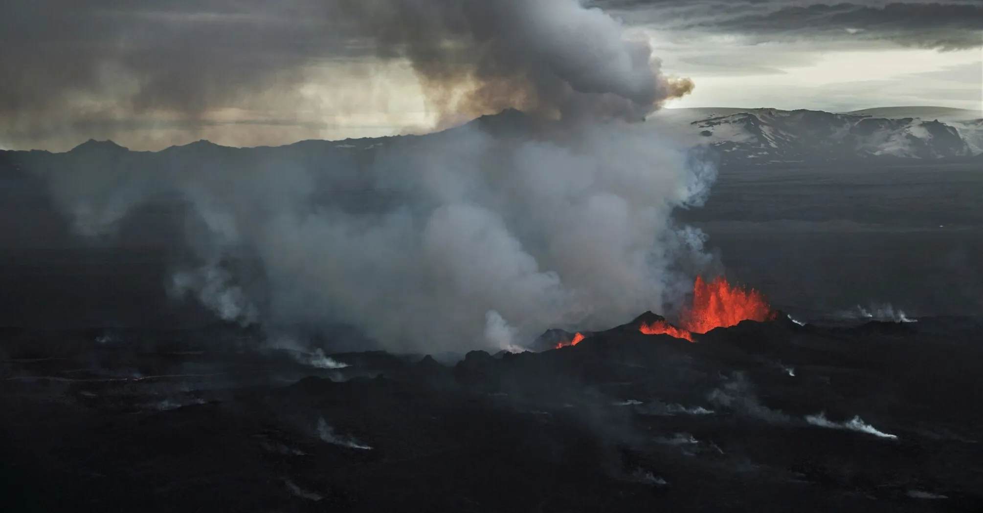 Volcanic eruption with smoke and lava on the Reykjanes Peninsula in Iceland