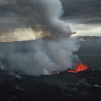 Volcanic eruption with smoke and lava on the Reykjanes Peninsula in Iceland