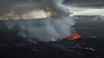 Volcanic eruption with smoke and lava on the Reykjanes Peninsula in Iceland