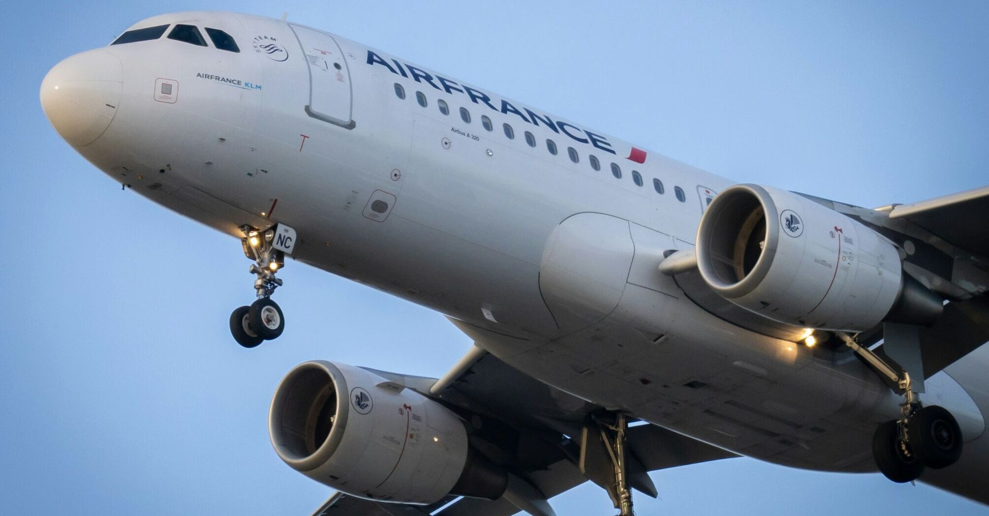 Air France-KLM airplane landing with Skyteam logo visible