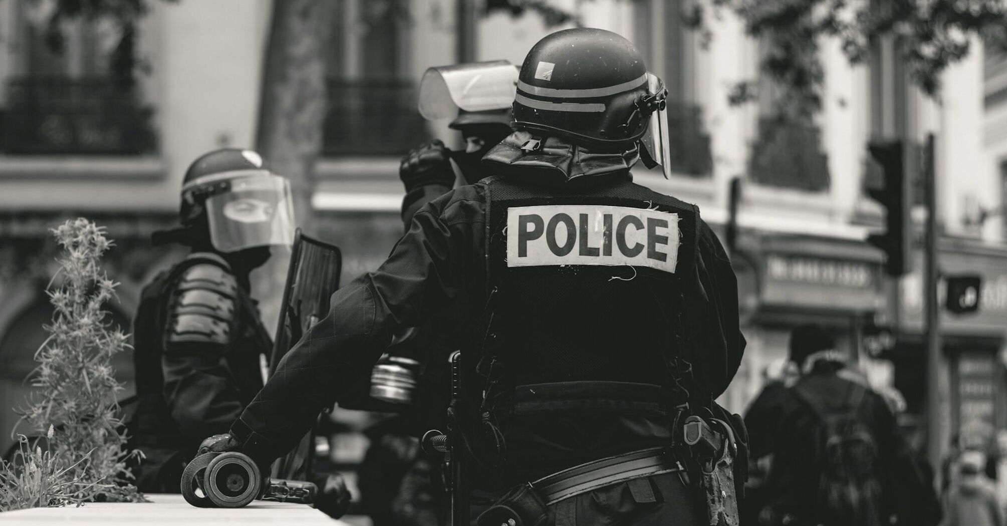 Police officers in riot gear during a protest