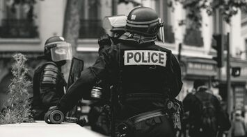Police officers in riot gear during a protest