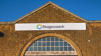 Stagecoach bus depot with bicycles and red buses in the background