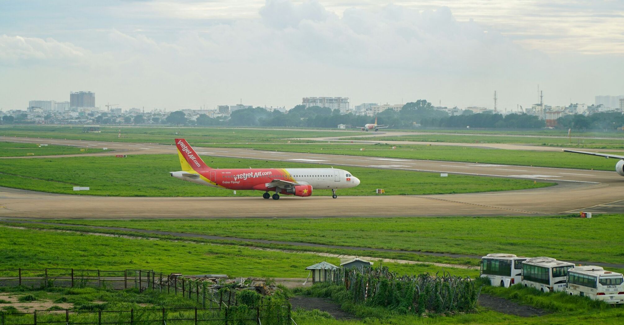 a large jetliner sitting on top of an airport runway