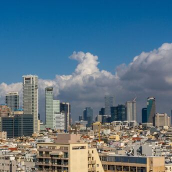 Skyline of Tel Aviv with modern buildings and blue sky