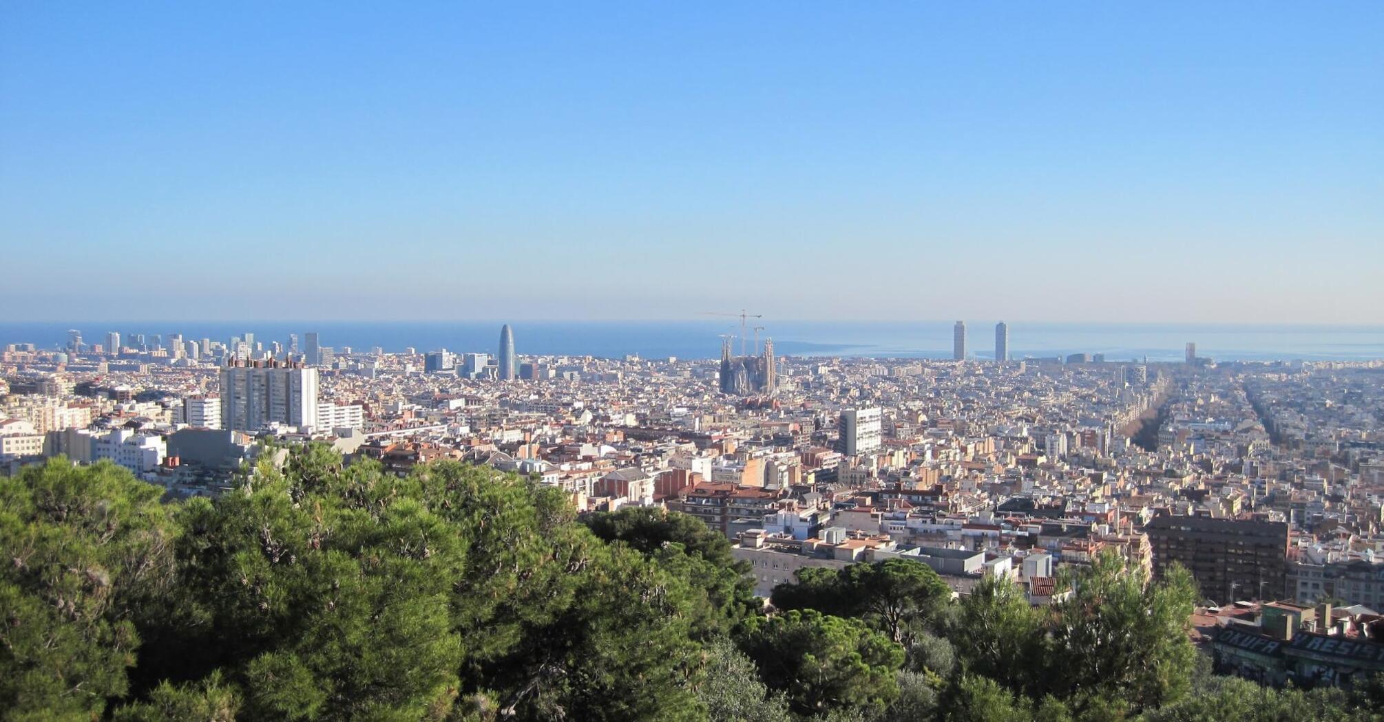 Panorama of Barcelona with Sagrada Familia and the sea