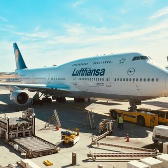 a large airplane is parked at an airport