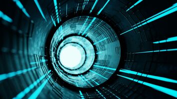 Futuristic tunnel with glowing blue lights