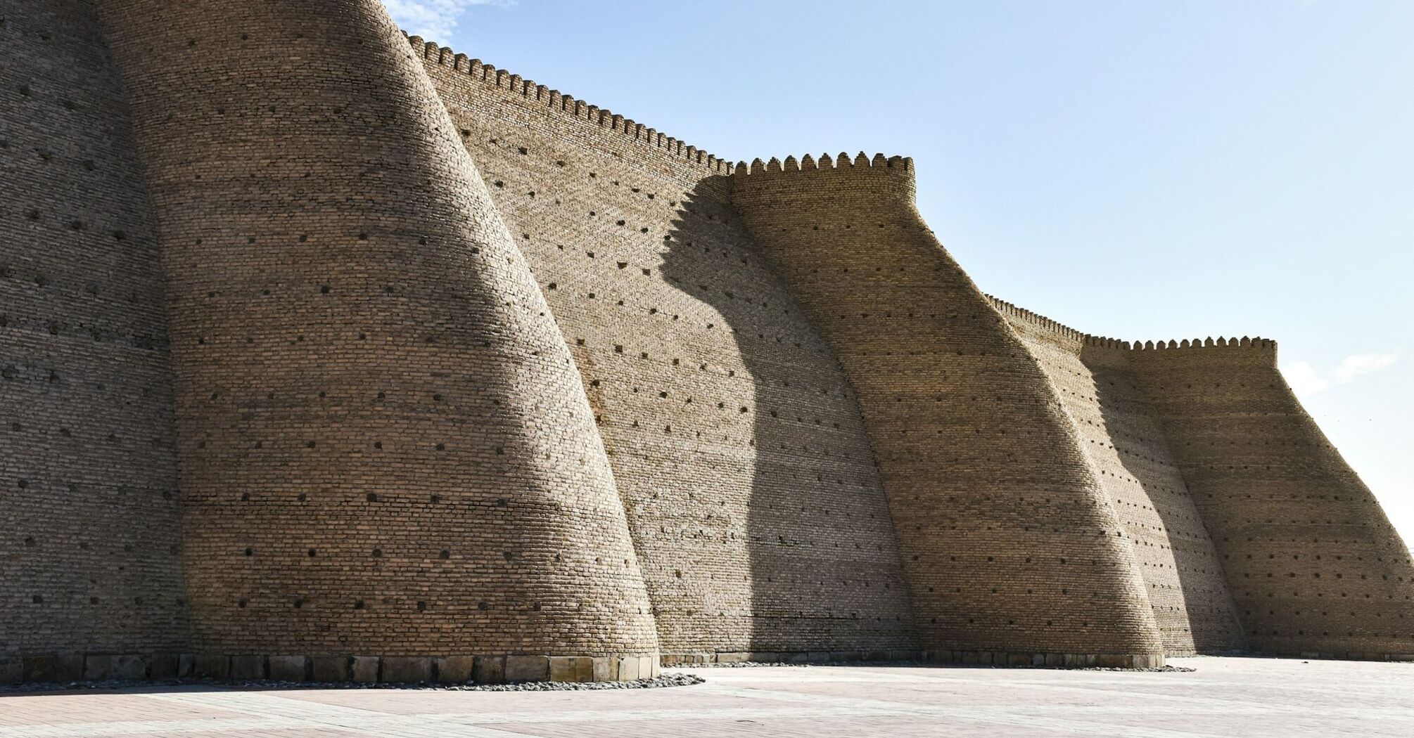 Massive fortified walls of Ark Fortress in Bukhara, Uzbekistan