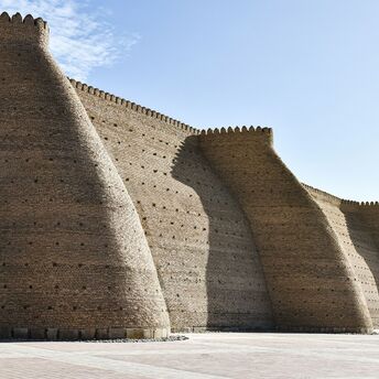 Massive fortified walls of Ark Fortress in Bukhara, Uzbekistan