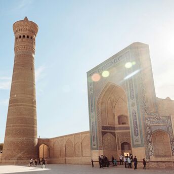 Kalyan Minaret and surrounding historical buildings in Bukhara, Uzbekistan