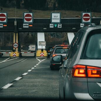 Cars waiting in line at an Austrian toll station