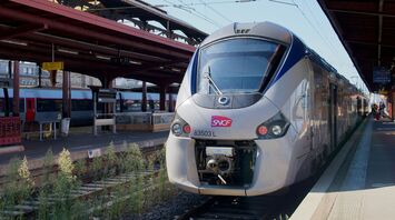 SNCF train at a railway station platform