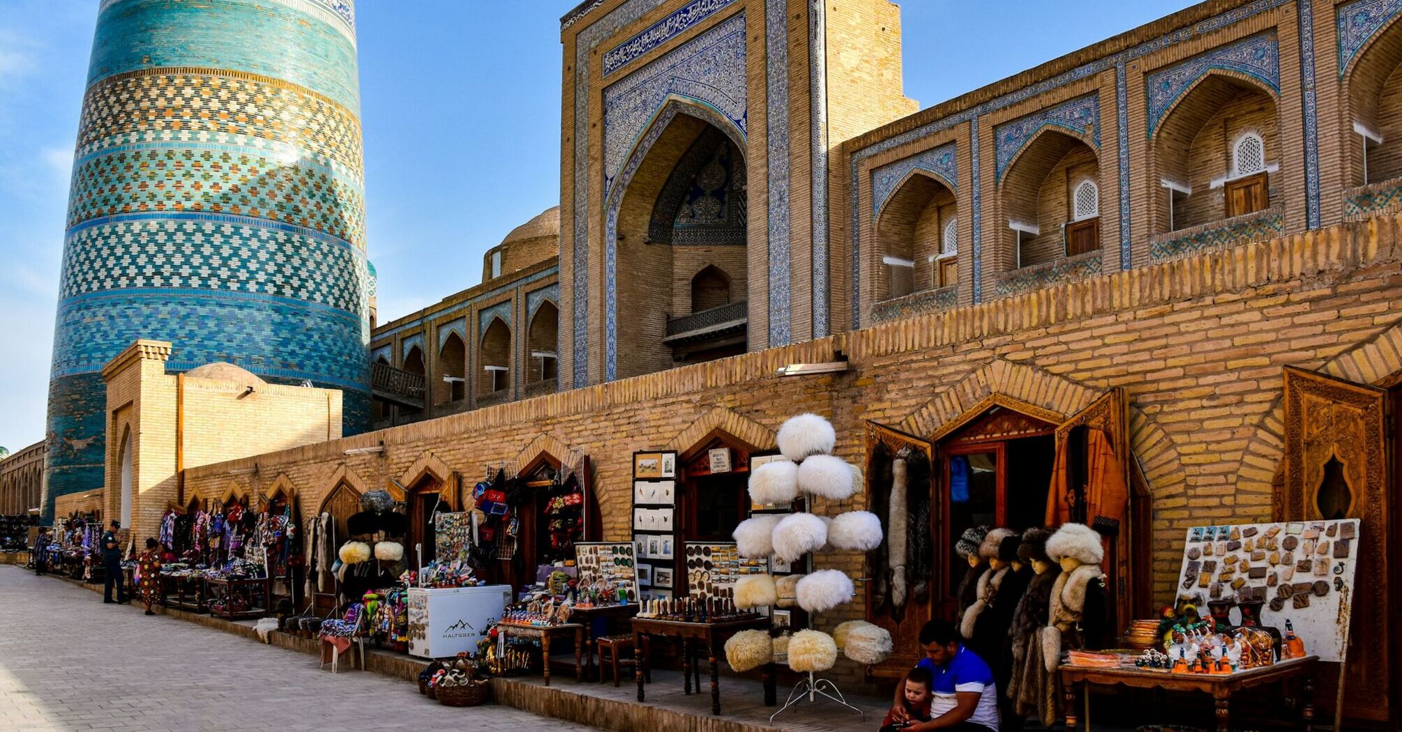 Kalta Minor Minaret and market stalls in Itchan Kala, Khiva