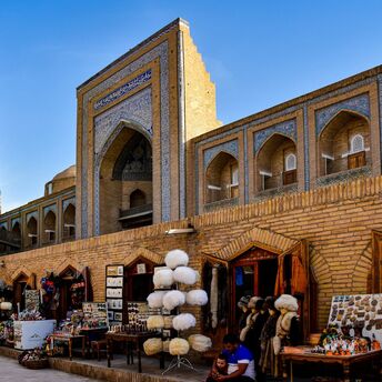 Kalta Minor Minaret and market stalls in Itchan Kala, Khiva