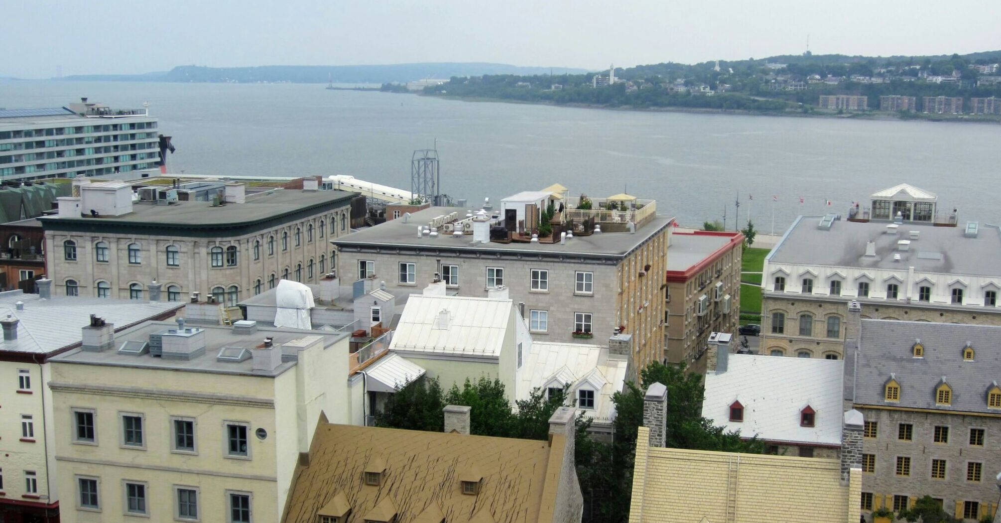 A view of historic buildings near a waterfront in Quebec