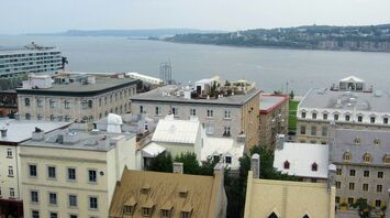 A view of historic buildings near a waterfront in Quebec