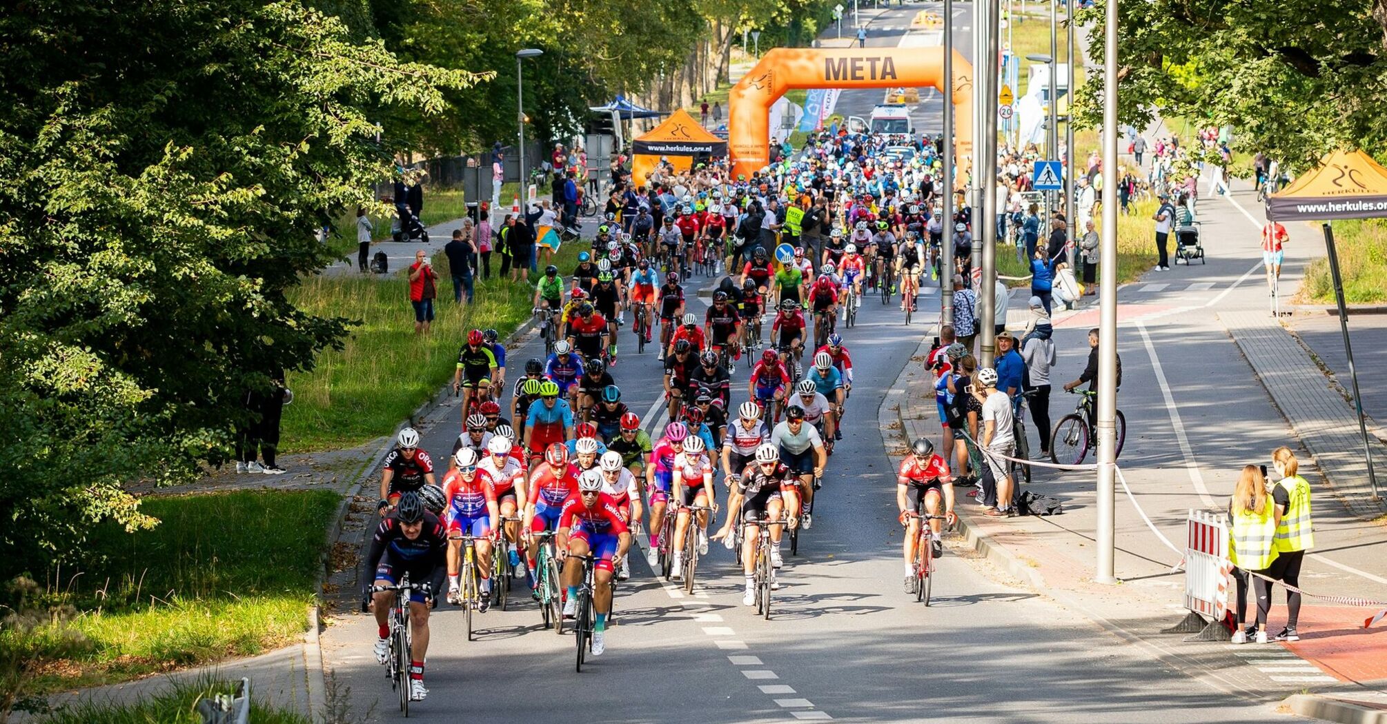 Cyclists participating in a large group event