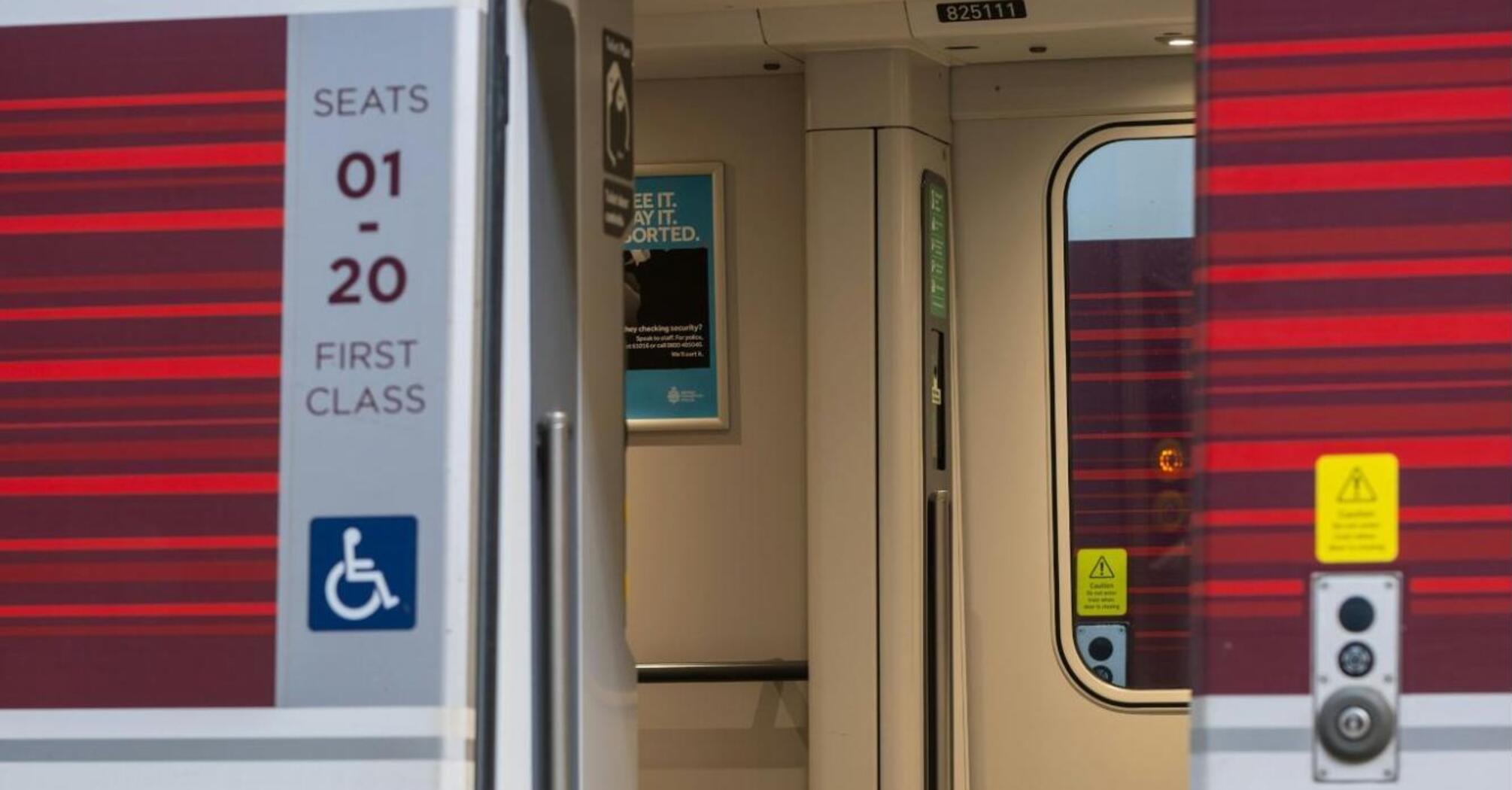 Open First-Class carriage door on an LNER train