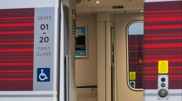 Open First-Class carriage door on an LNER train