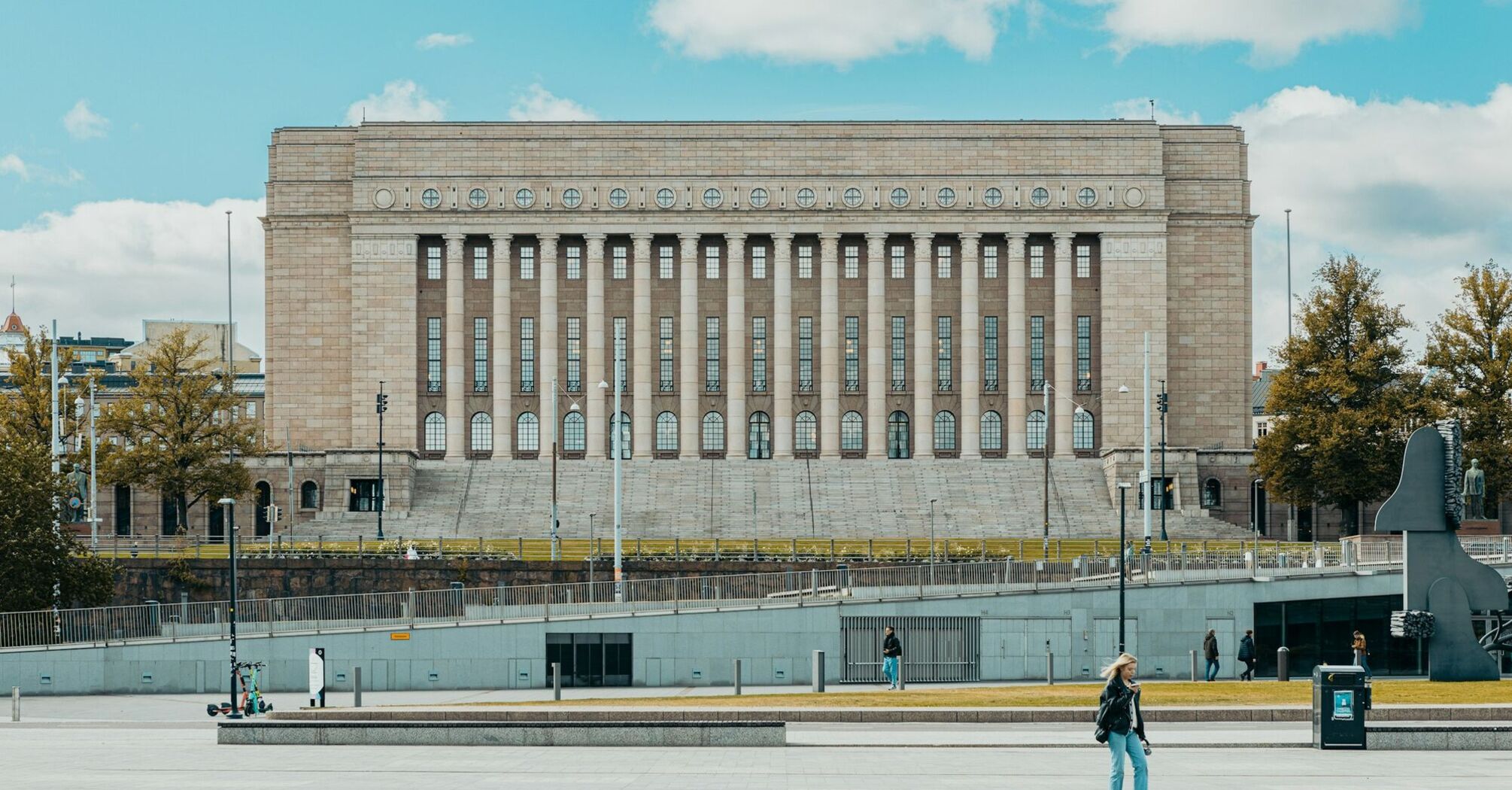 The Finnish Parliament building on a clear day