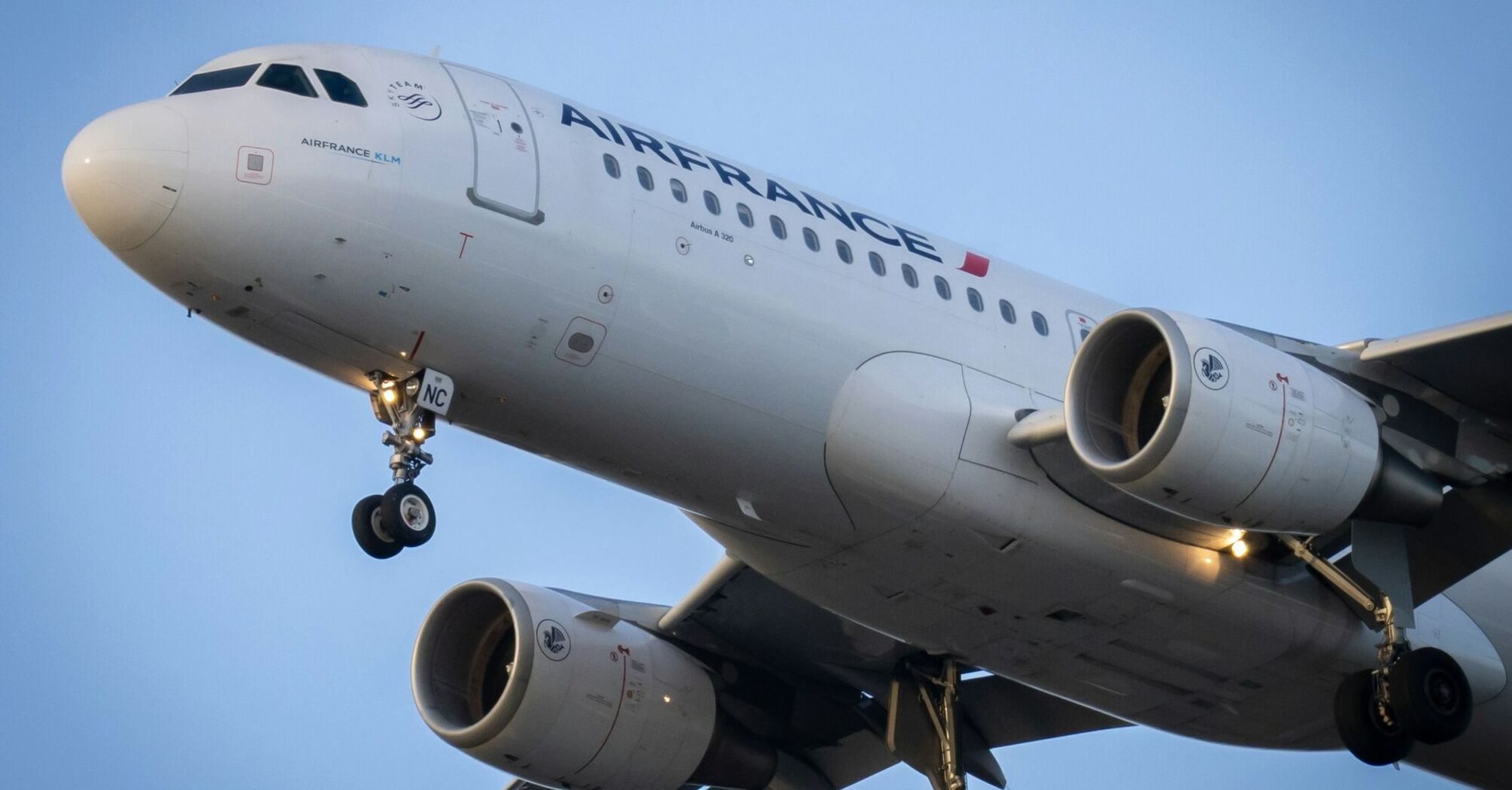 An Air France Airbus A320 aircraft in flight preparing for landing