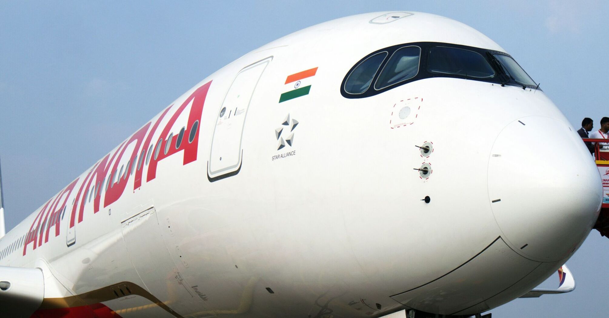 Air India aircraft at an airport with visible logos