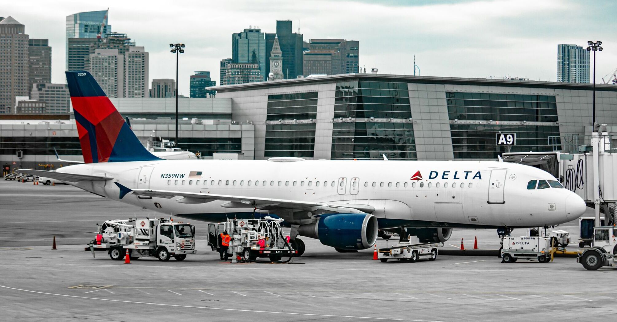 white passenger plane on airport during daytime